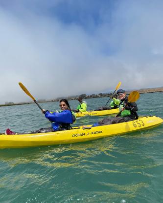 Two pairs of Hervey-Jumper lab members kayaking