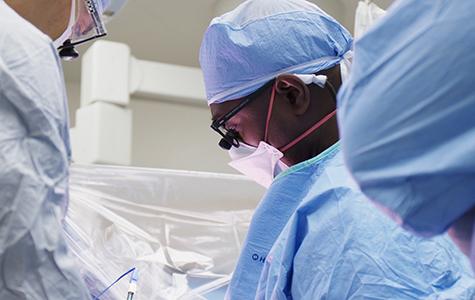 UCSF neurosurgeon Shawn Hervey-Jumper during an awake brain surgery. Image courtesy of Walter Zarnowitz.
